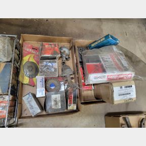 6 containers of oil filters and other misc parts