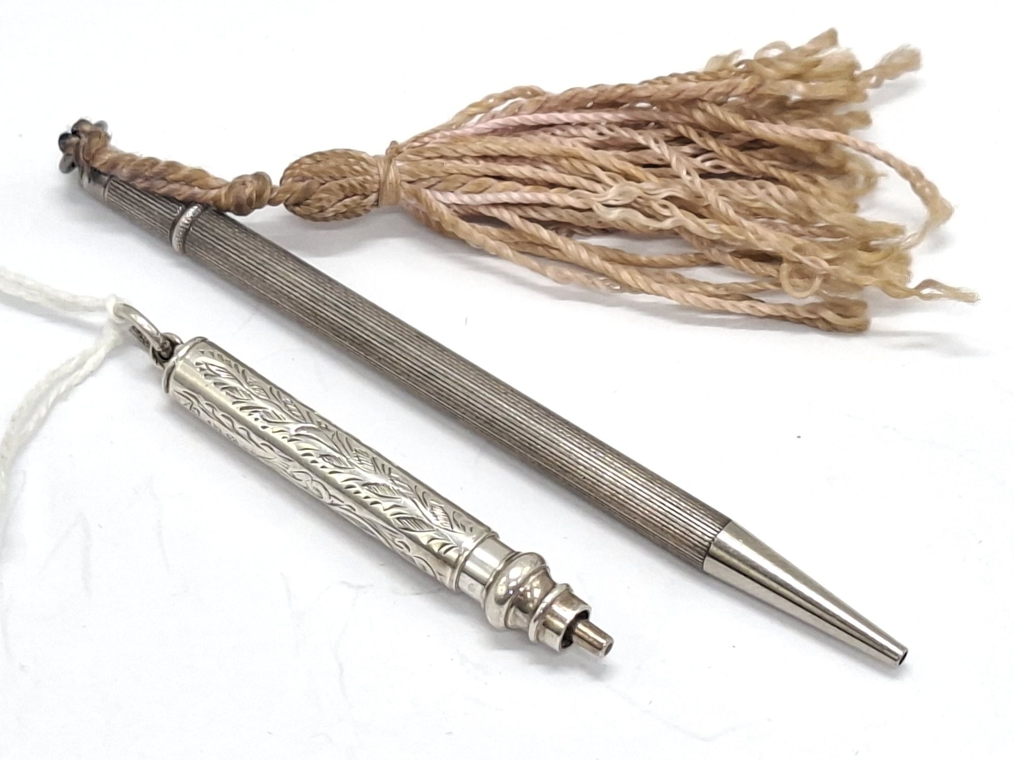 1037 · TWO STERLING SILVER CHATELAINE PENCILS