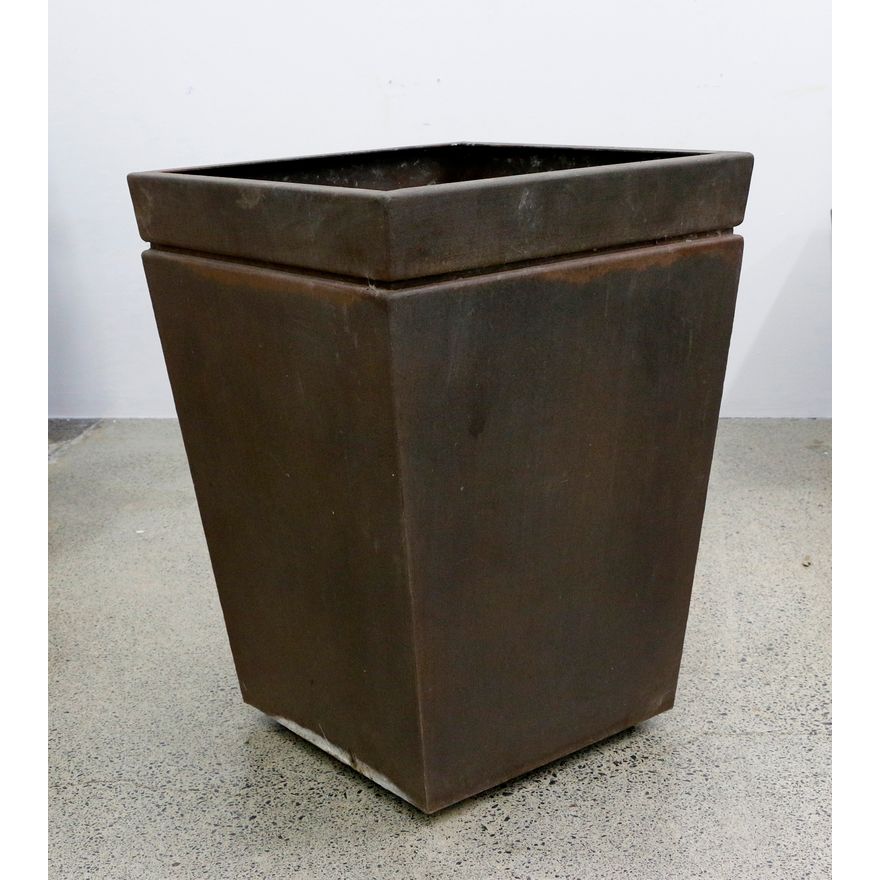 A large metal planter
