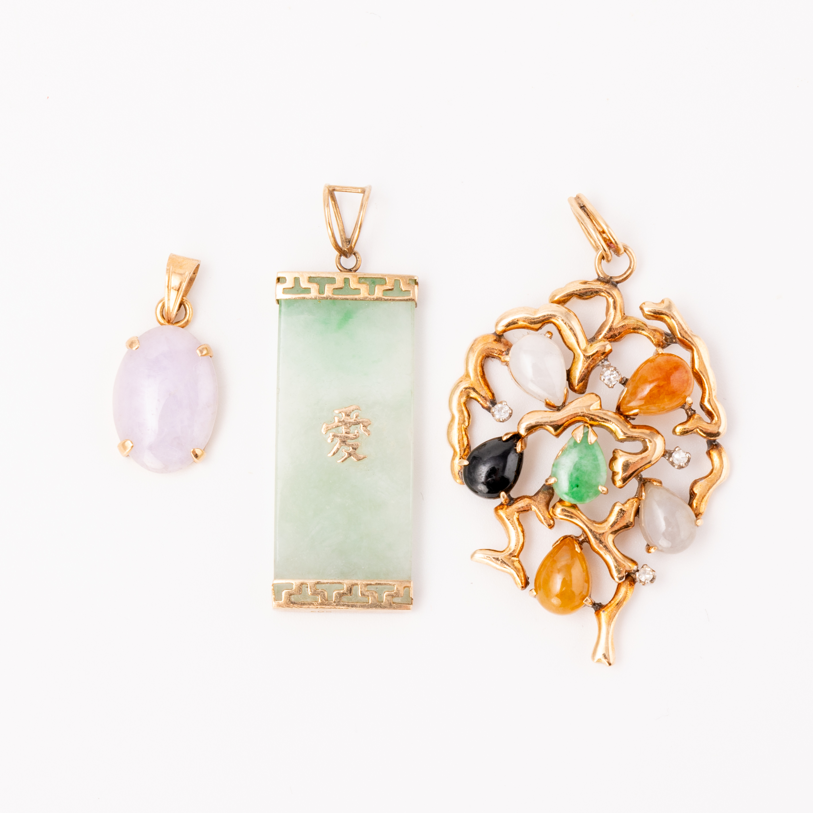 Three 14ct Gold Jade Pendants