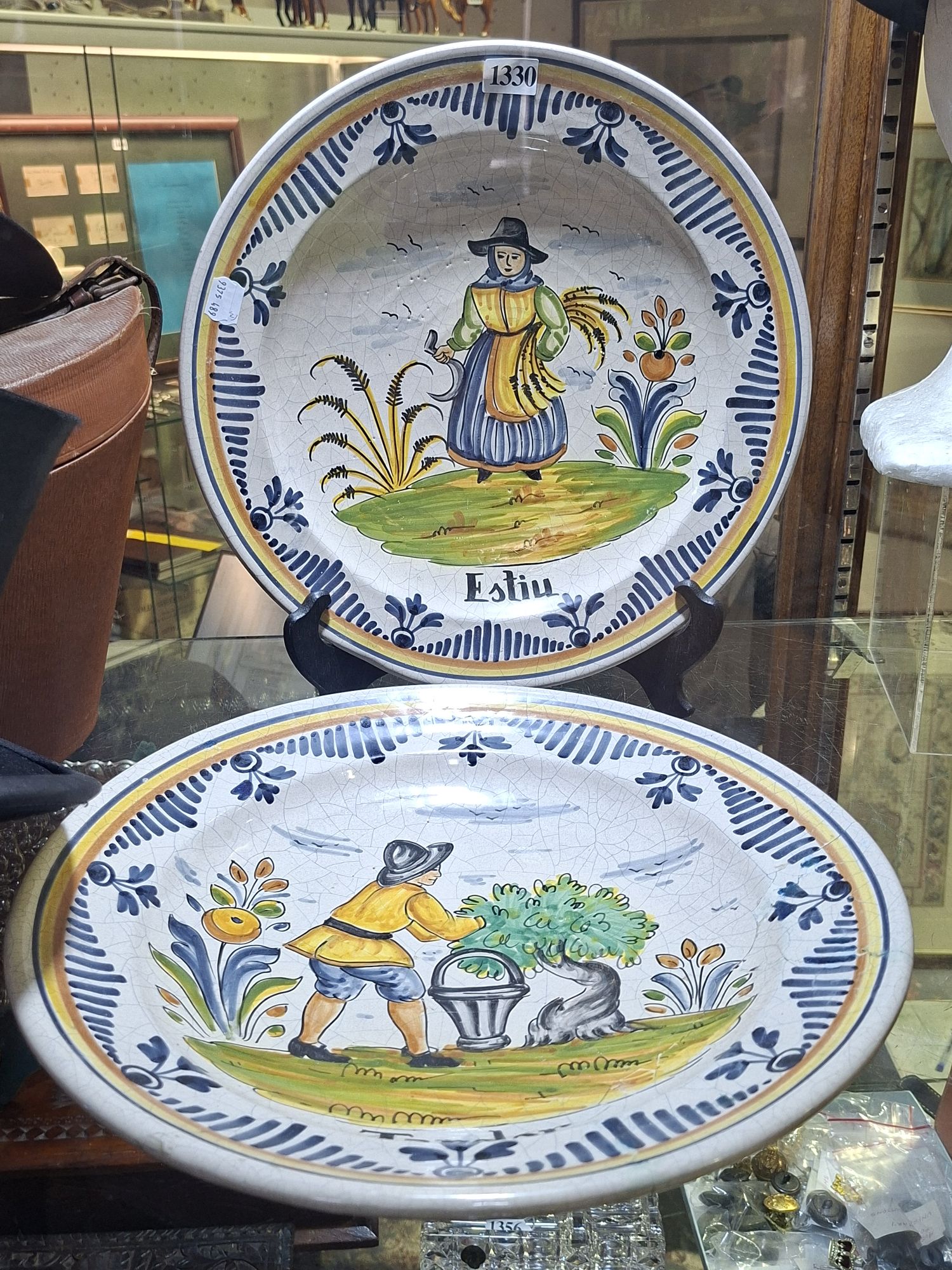 TWO FAIENCE WALLPLATES