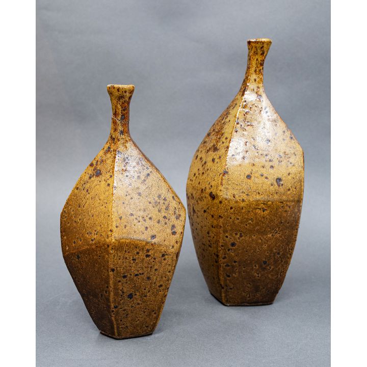 Col Levy - Asymmetrical pair of faceted bottle vases