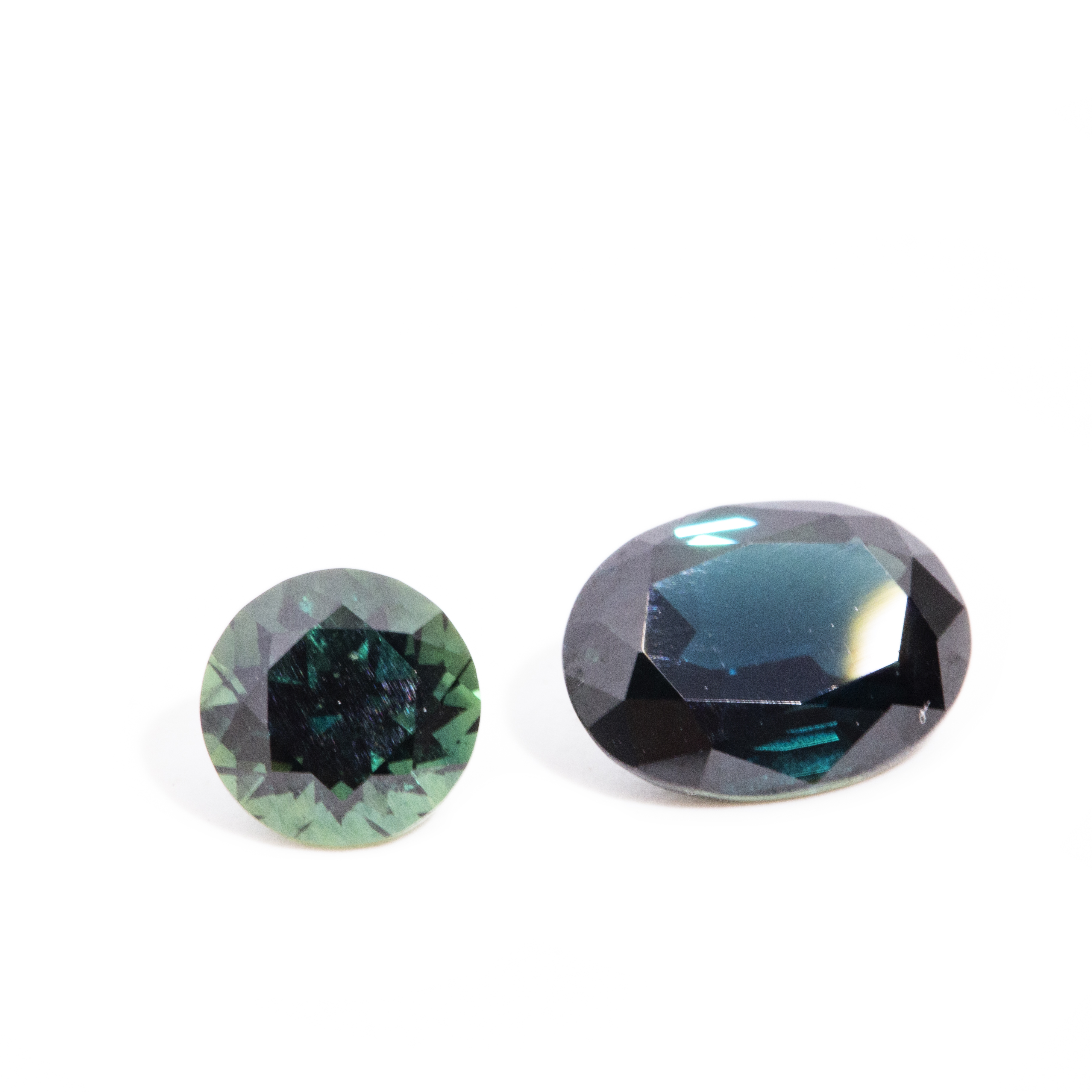 162 · 2.16 Carat Teal Sapphire & 1.28 Carat Green Sapphire