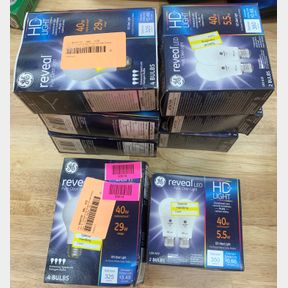 (8) REVEAL HD LIGHT 40 W 4 PACK & REVEAL HD LIGHT 2 PACK