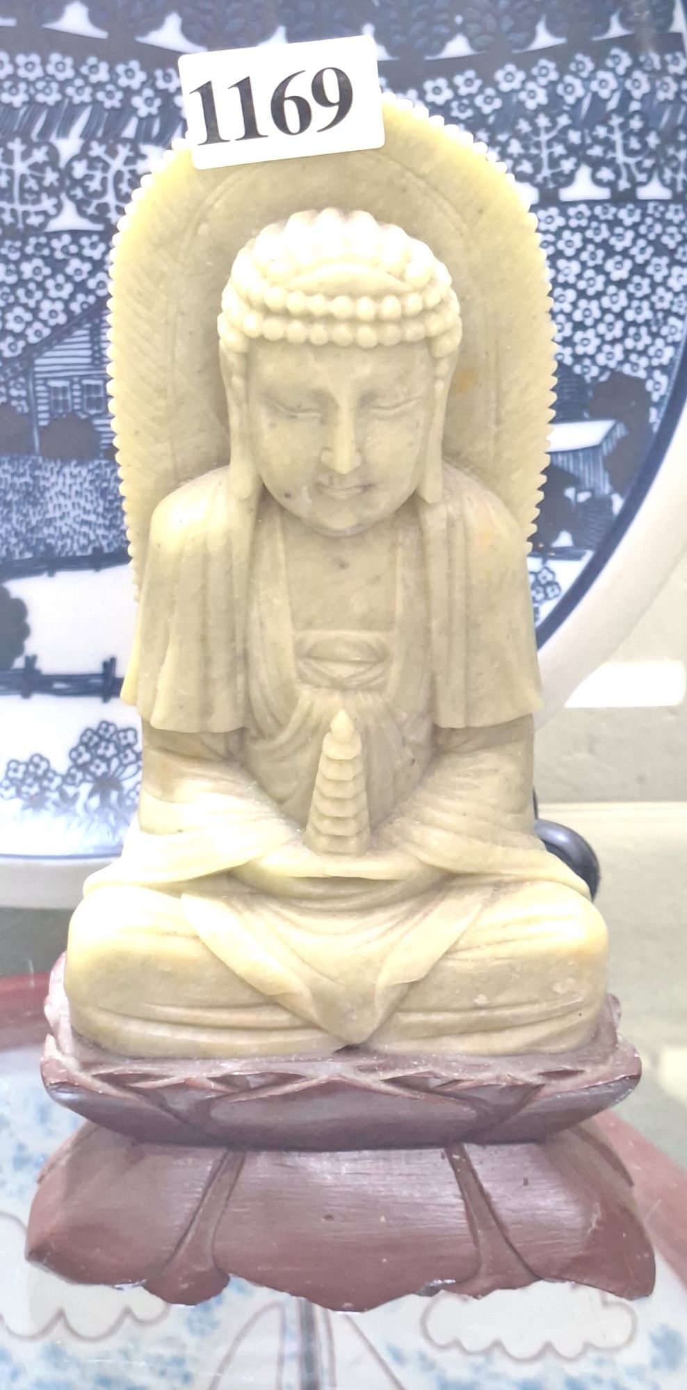 1169 · CARVED STONE FIGURINE
