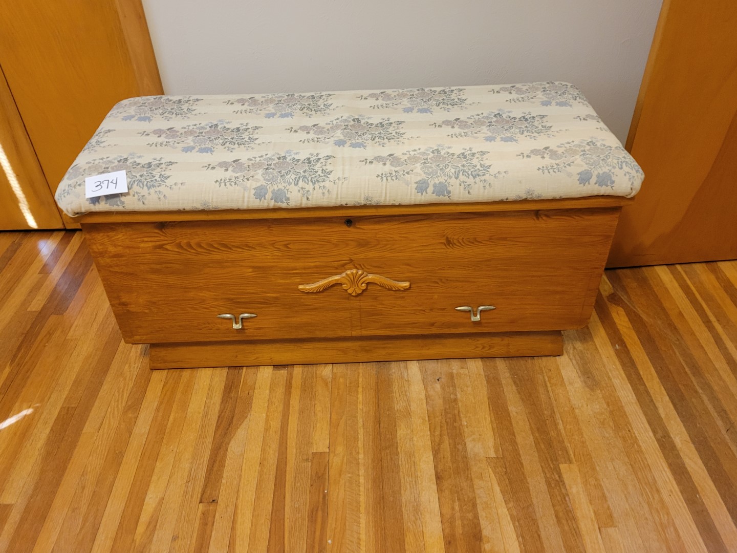 Wood padded top cedar chest Midwest Auctions, LLC