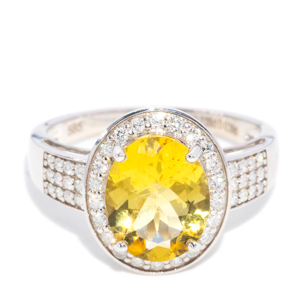 89 · 2.06 Carat Golden Heliodor and Diamond Halo Ring