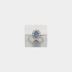 0.8110CT OVAL SAPPHIRE & 0.240CT DIAMONDS IN 9CTWHITE GOLD RING - 51929/3524