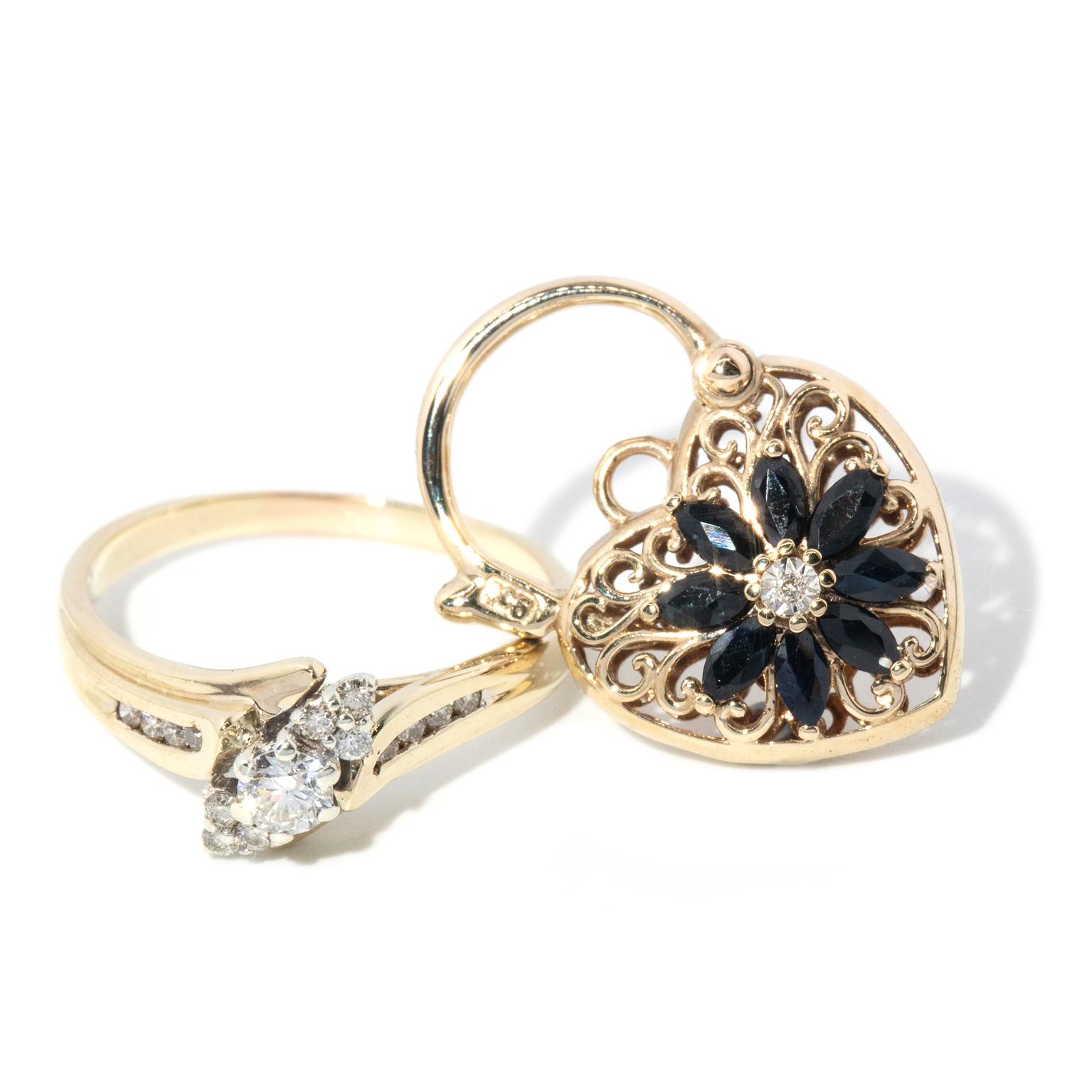 26 · Sapphire & Diamond Padlock in 9ct Gold & Diamond Cluster Ring in 9ct Gold