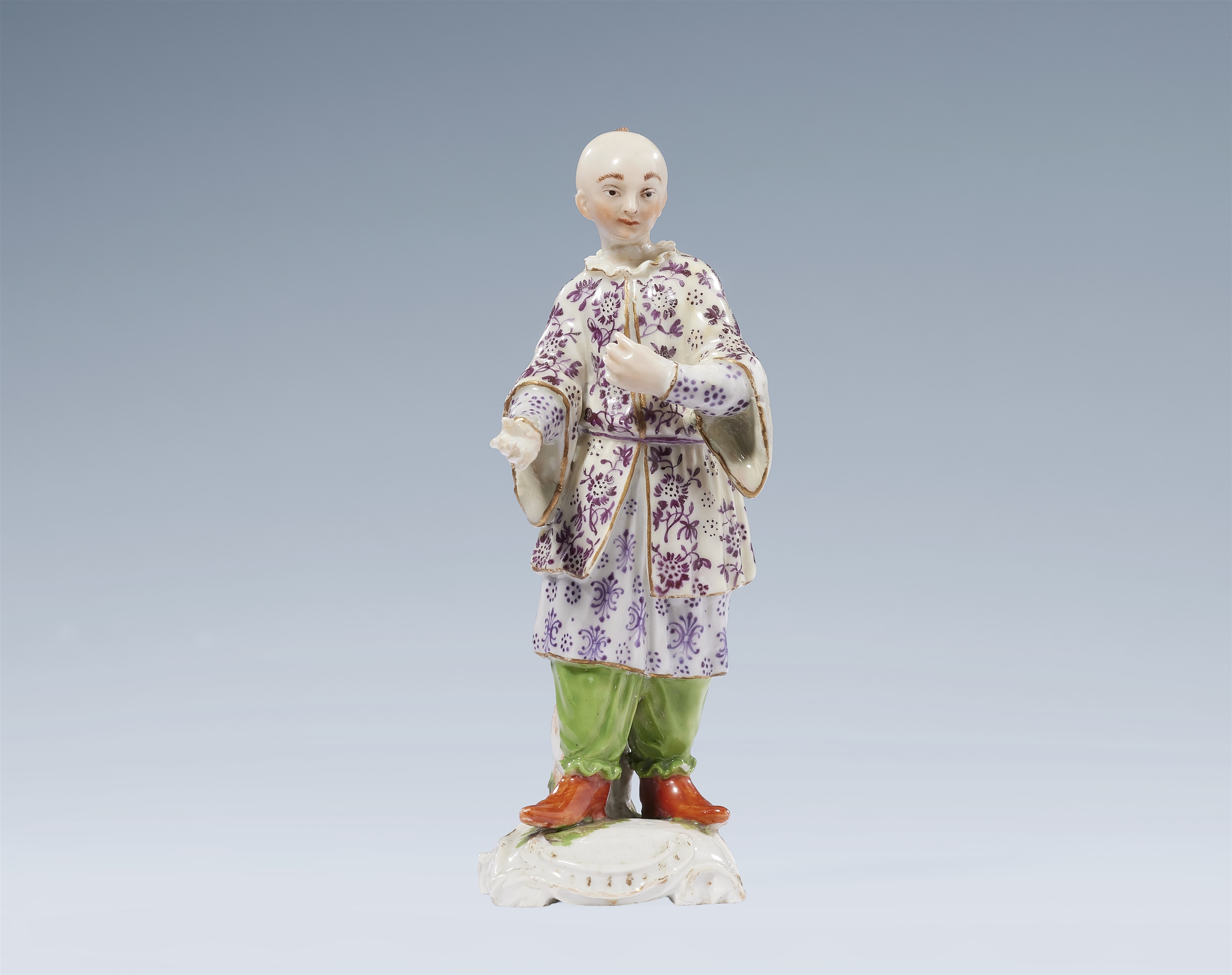 A small Ludwigsburg porcelain figure of a Chinese man by Johann Wilhelm Götz