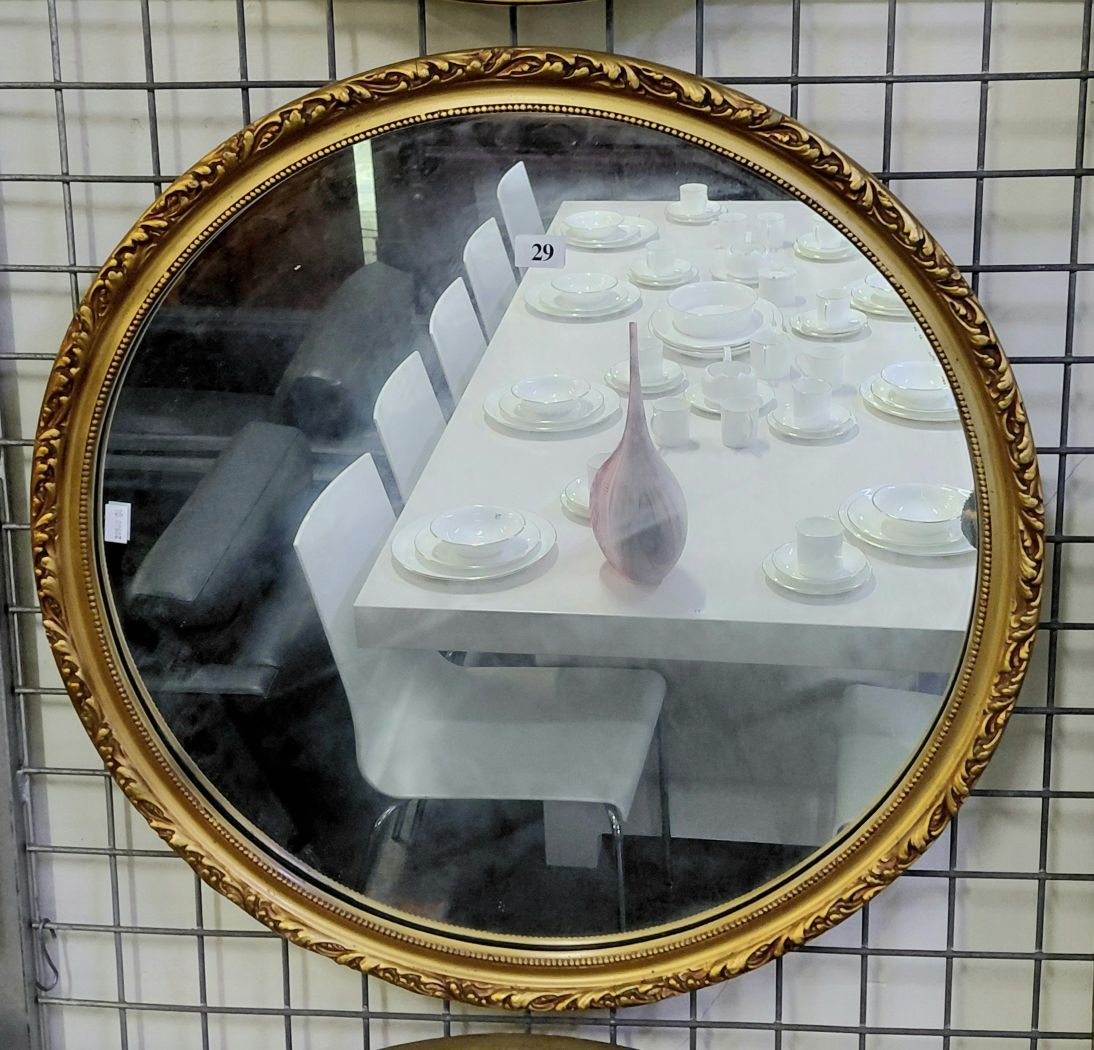29 · CIRCULAR GILT FRAMED MIRROR