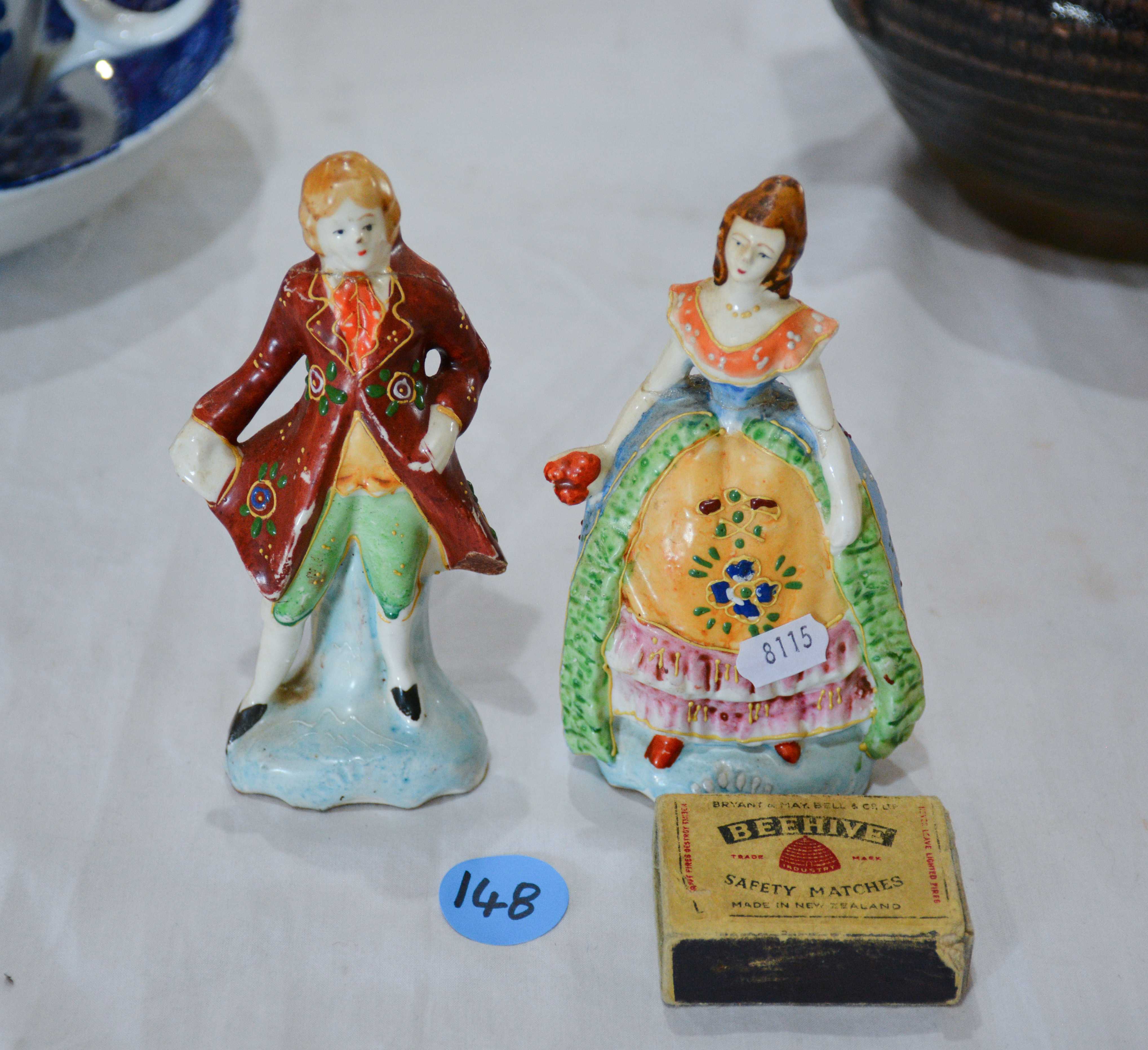Japan Made Figure Ornaments x 2 — sold at auction in New Zealand for $10