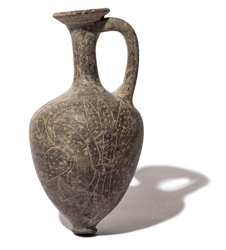 An Egyptian Tell el-Yahudiya-Ware Juglet
Height 5 5/16 inches (14 cm).