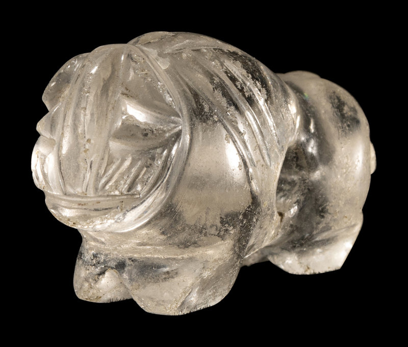 A Western Asiatic Rock Crystal Recumbent Lion
Height 2 inches (5.10 cm).