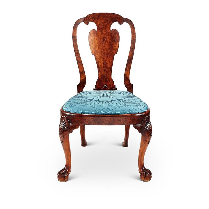 A George II carved walnut side chair in the manner of Giles Grendey