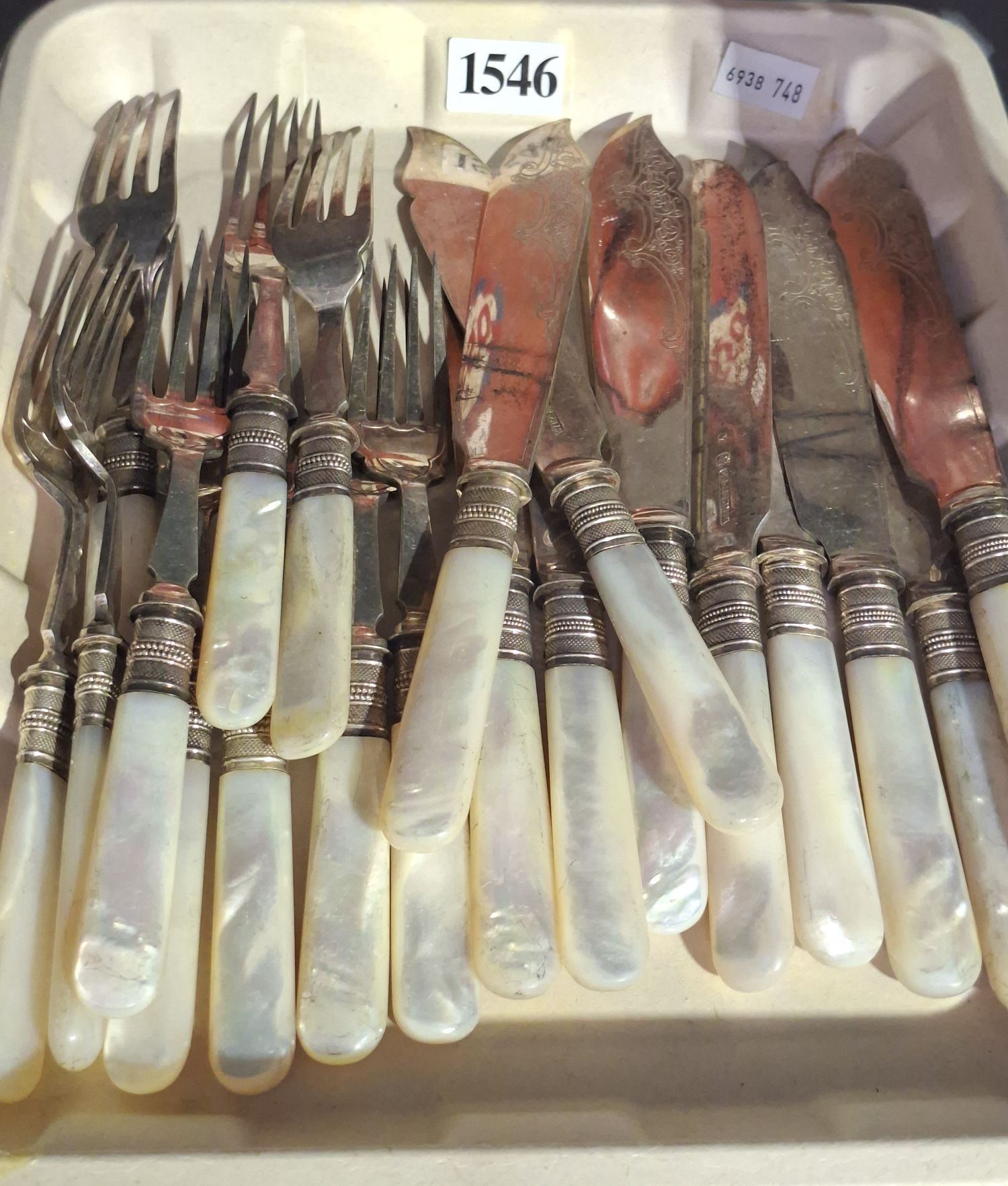 COLLECTION OF MOTHER OF PEARL HANDLED CUTLERY