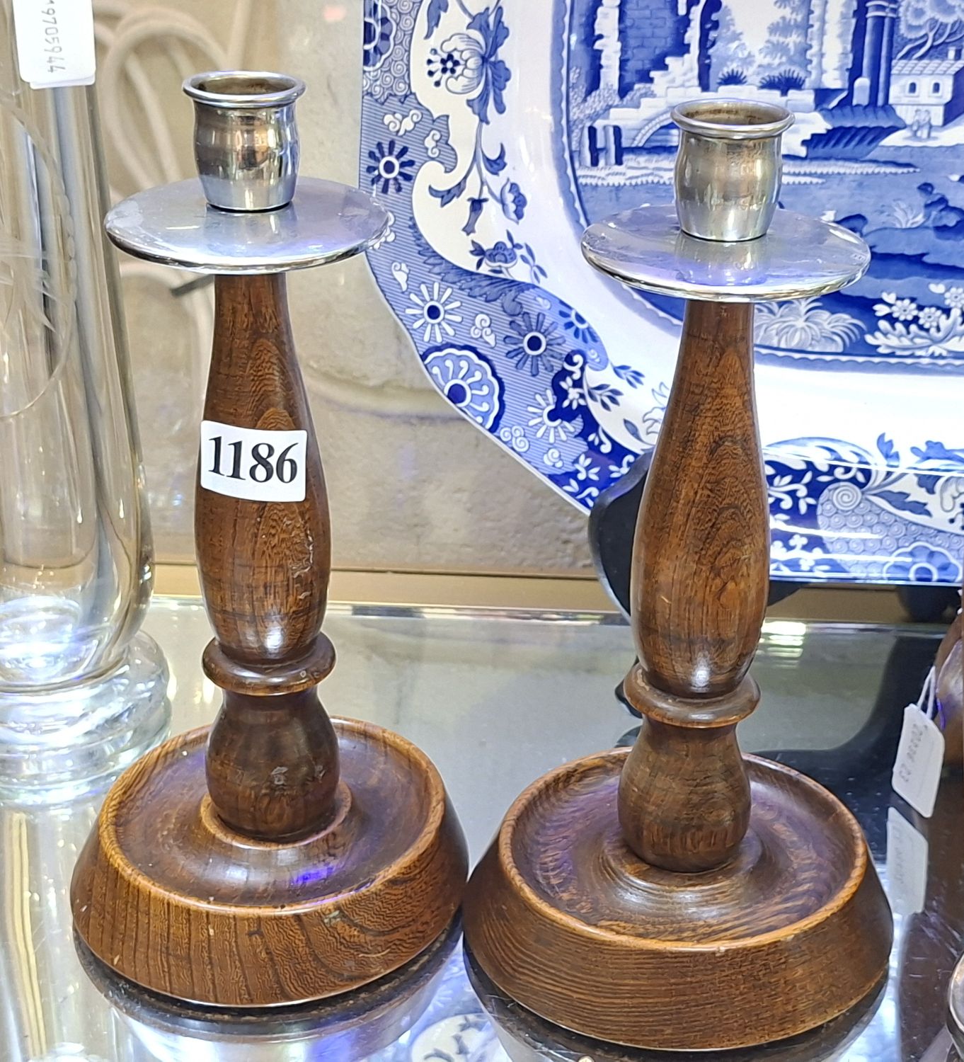 A PAIR OF OAK CANDLESTICKS