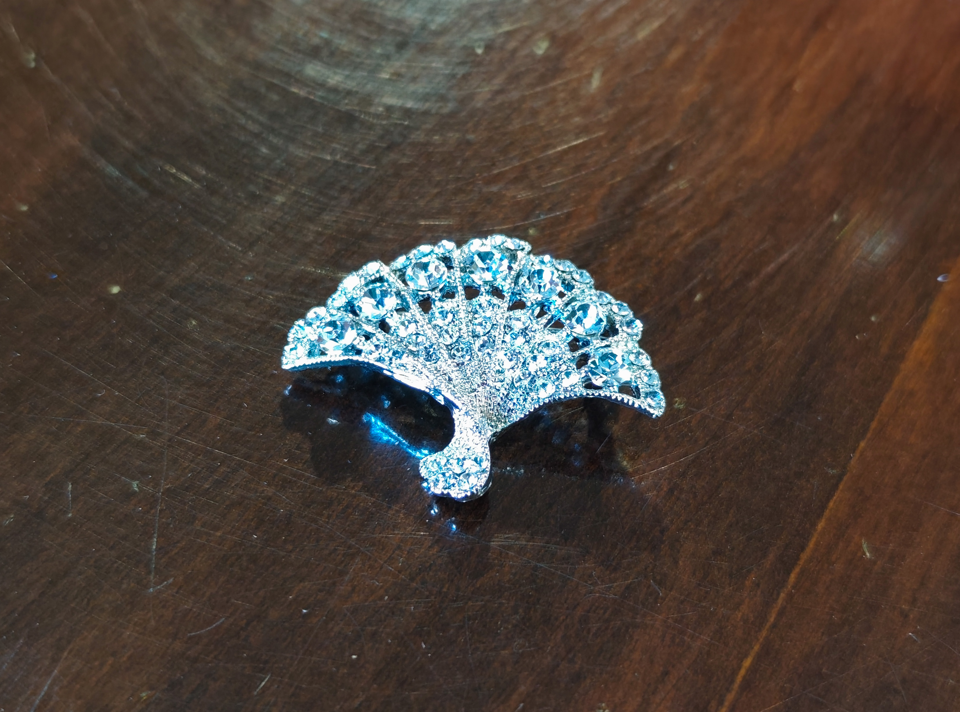 Silver Coloured Brooch with Clear Stones — sold at auction in New Zealand for $30