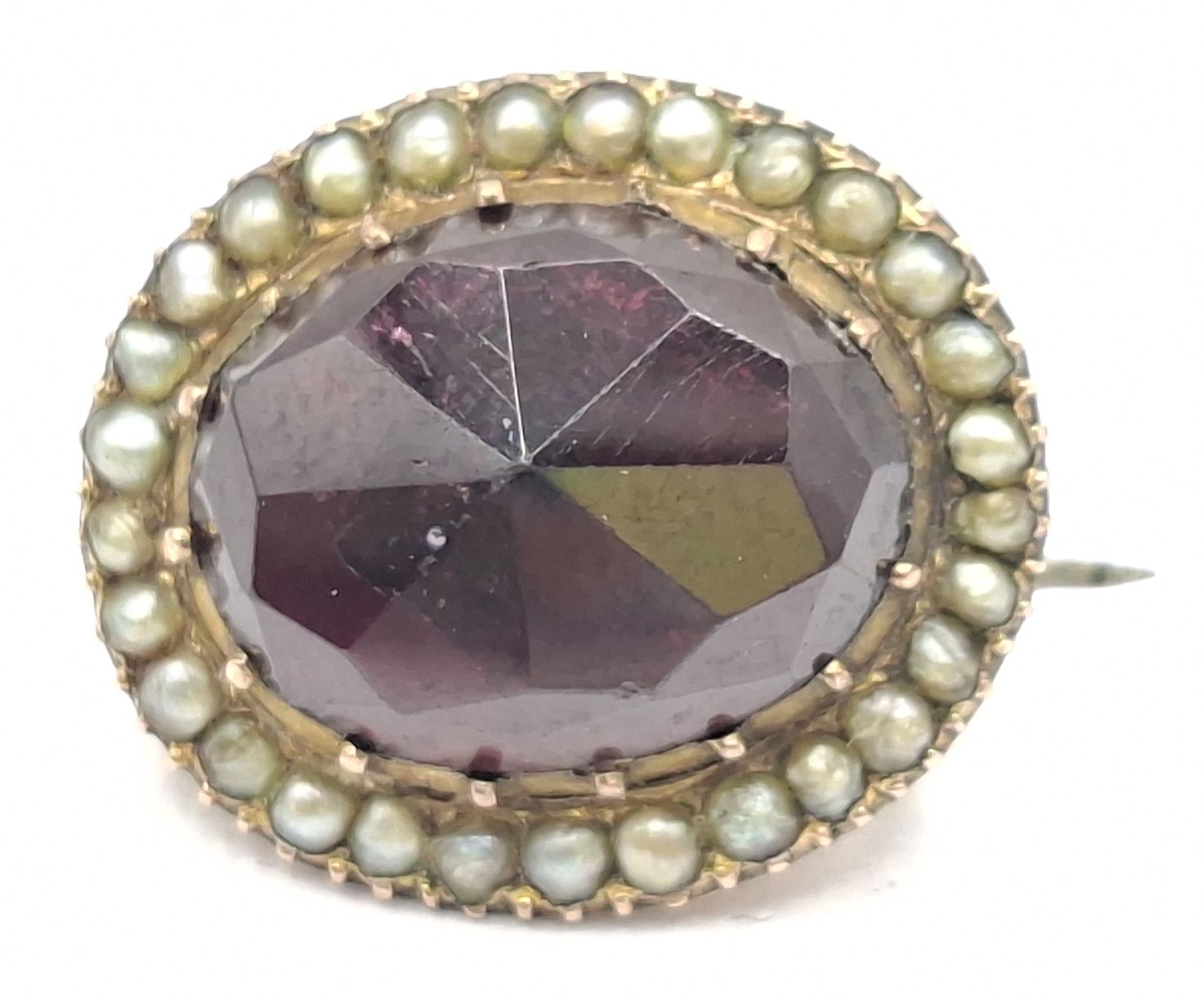 1068 · GOLD PLATED GARNET BROOCH