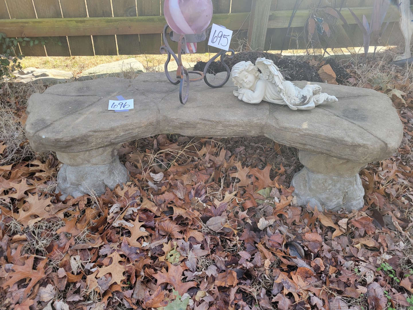 Stone garden bench Midwest Auctions, LLC