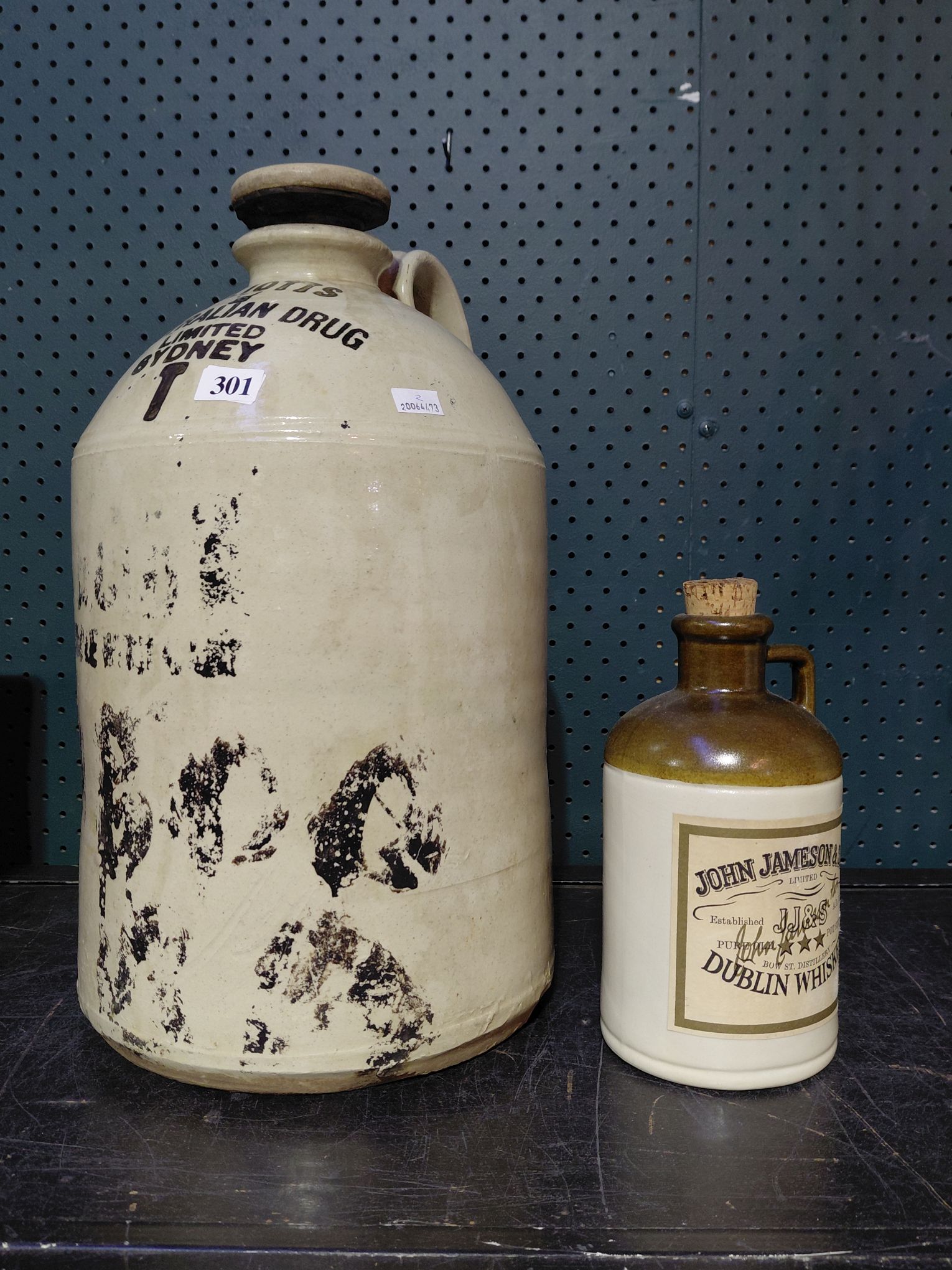 301 · STONEWARE DEMIJOHN