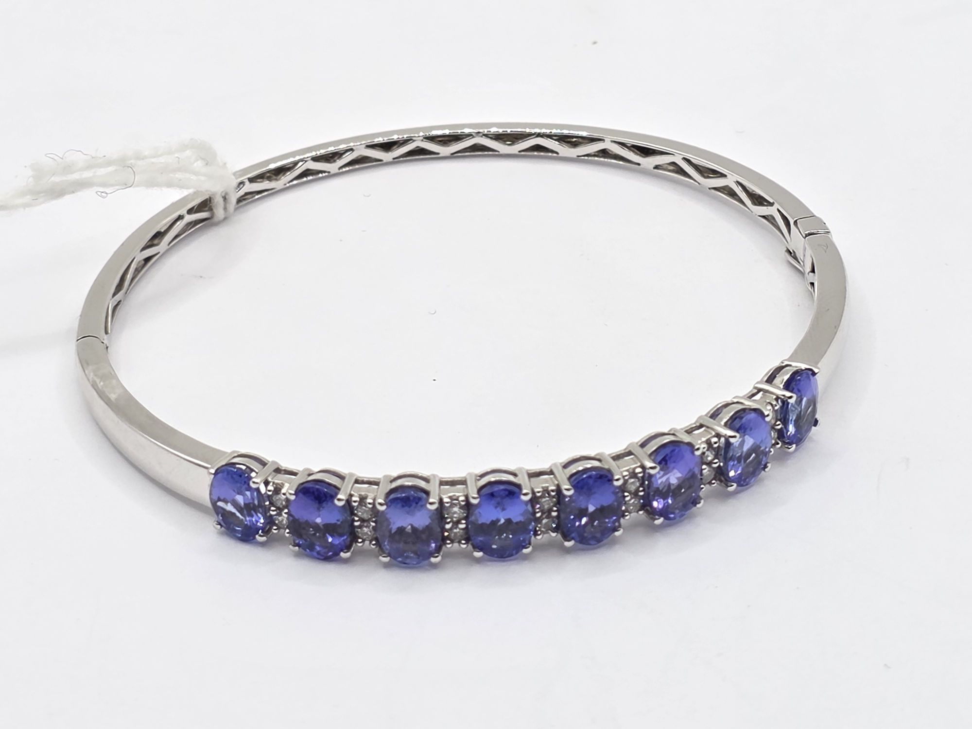 290 · 14CT GOLD TANZANITE DIAMOND BANGLE