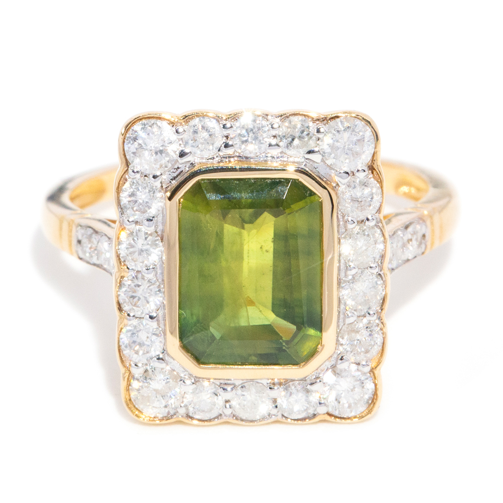20 · 2.77 Carat Green Sapphire and Diamond Halo Ring in 14ct Gold