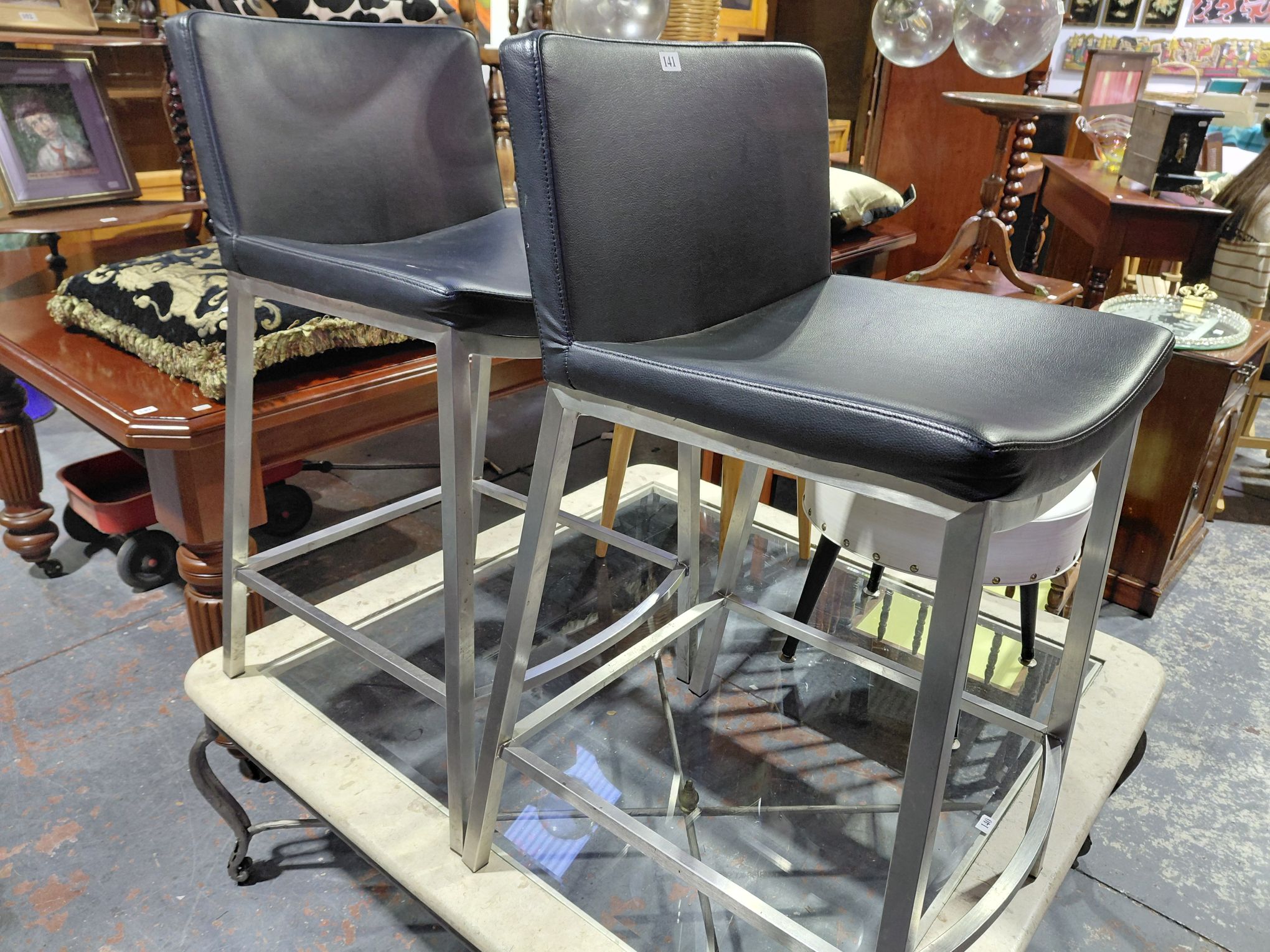 141 · THREE BAR STOOLS