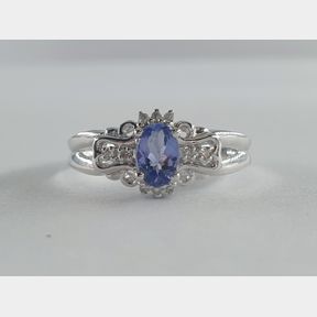 9CT WHITE GOLD DIAMOND RING WITH 0,05CT DIAMONDS & 0,300CT OVAL TANZANITE - 51929/12331