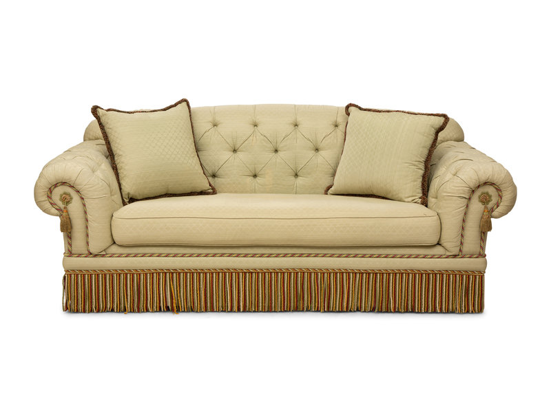 A Button-Tufted Sofa with Scalamandré Upholstery 
Height 38 x width 89 x depth 41 inches.