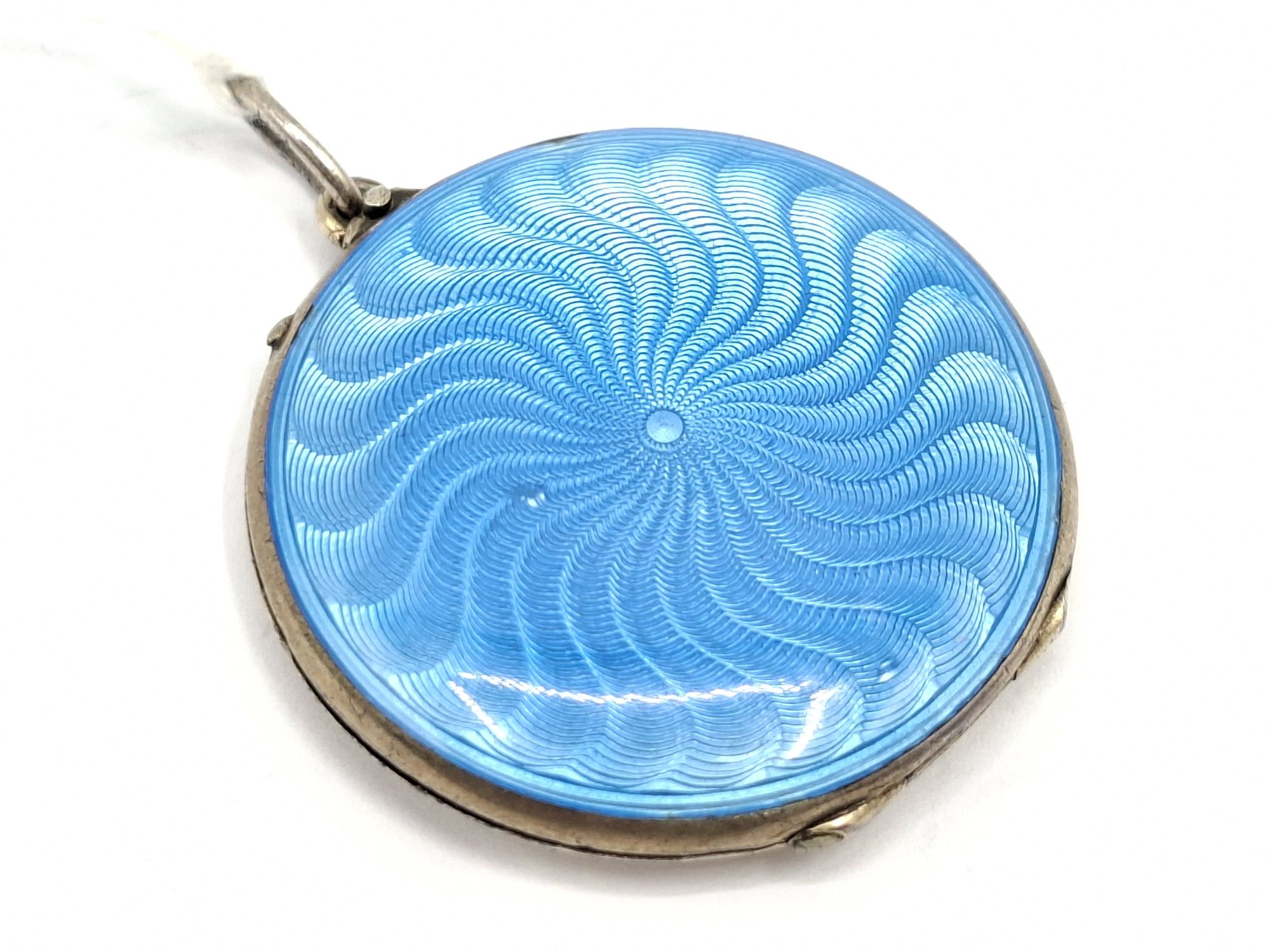 SILVER, GILT AND GUILLOCHE LOCKET