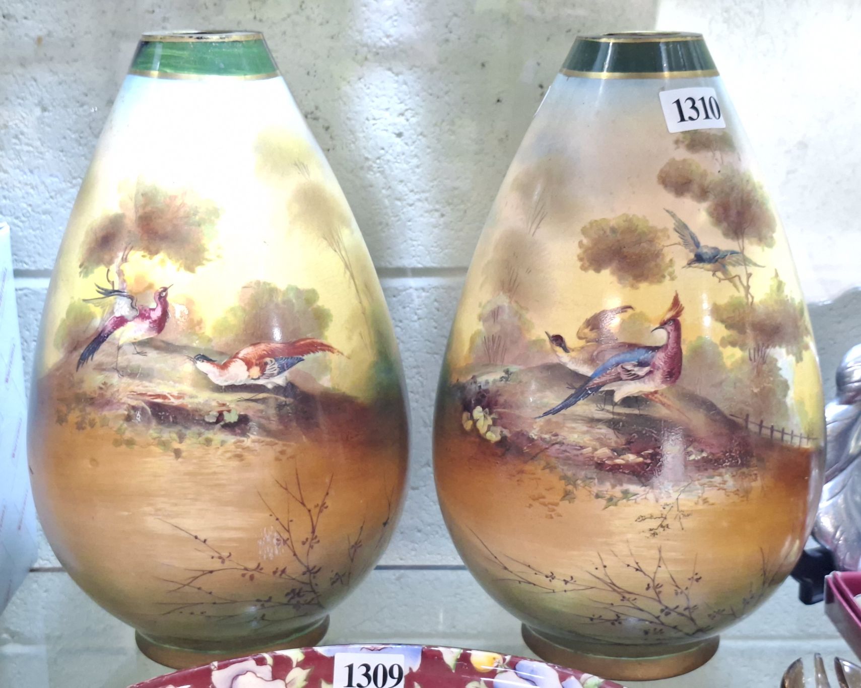 1310 · A PAIR OF ANTIQUE MANTLE VASES