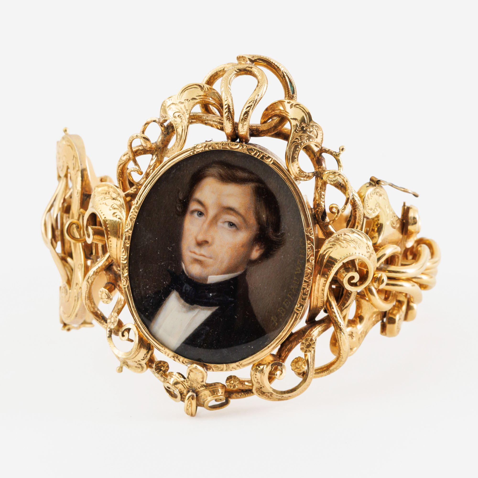 An impressive 18-karat gold bracelet set with a miniature portrait of a man. Signed and dated 'P – kavel bij Bernaerts, Antwerp