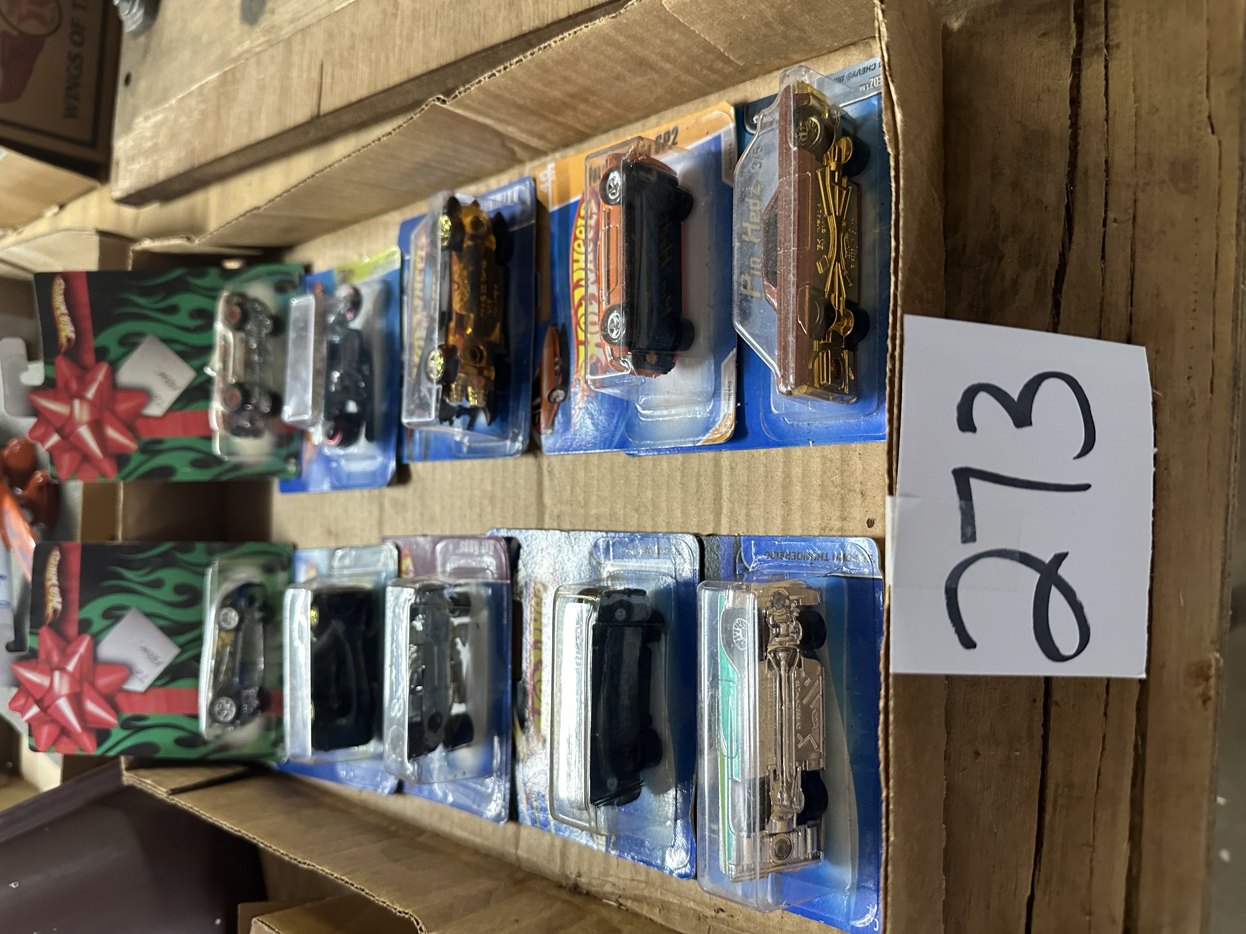 Collectible hotwheels in packages Midwest Auctions, LLC