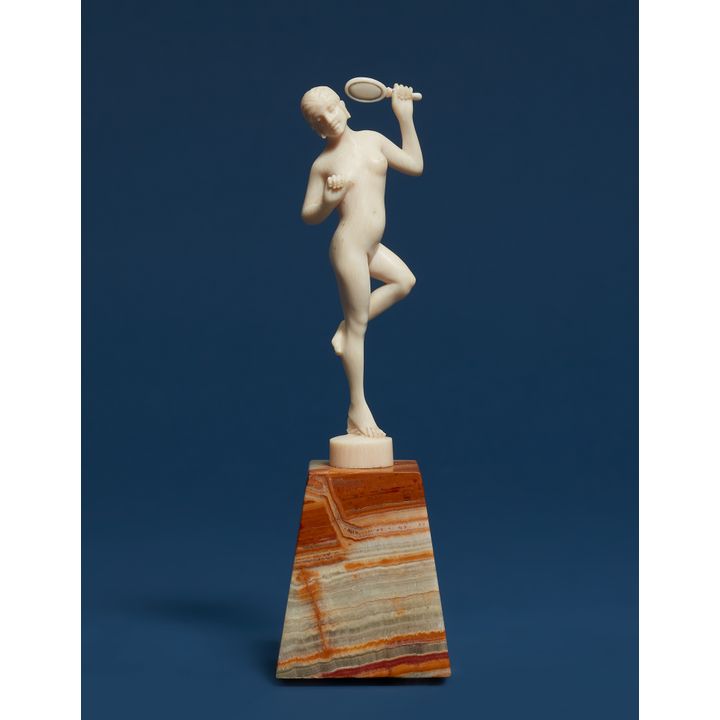 Nude standing on one leg with a hand mirror by Joé Descomps (1869 - 1950)