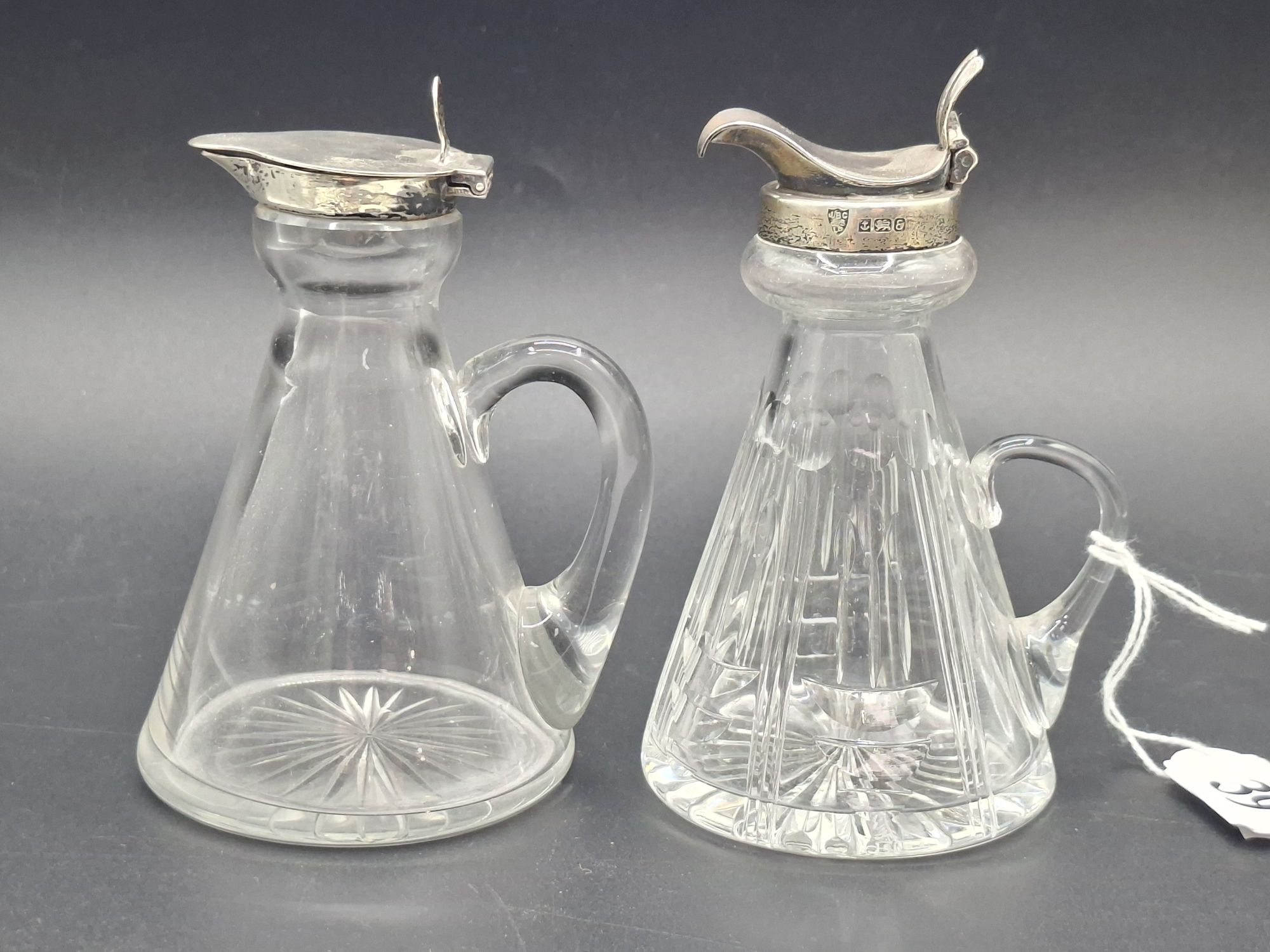 39 · TWO ANTIQUE WHISKEY NOGGINS