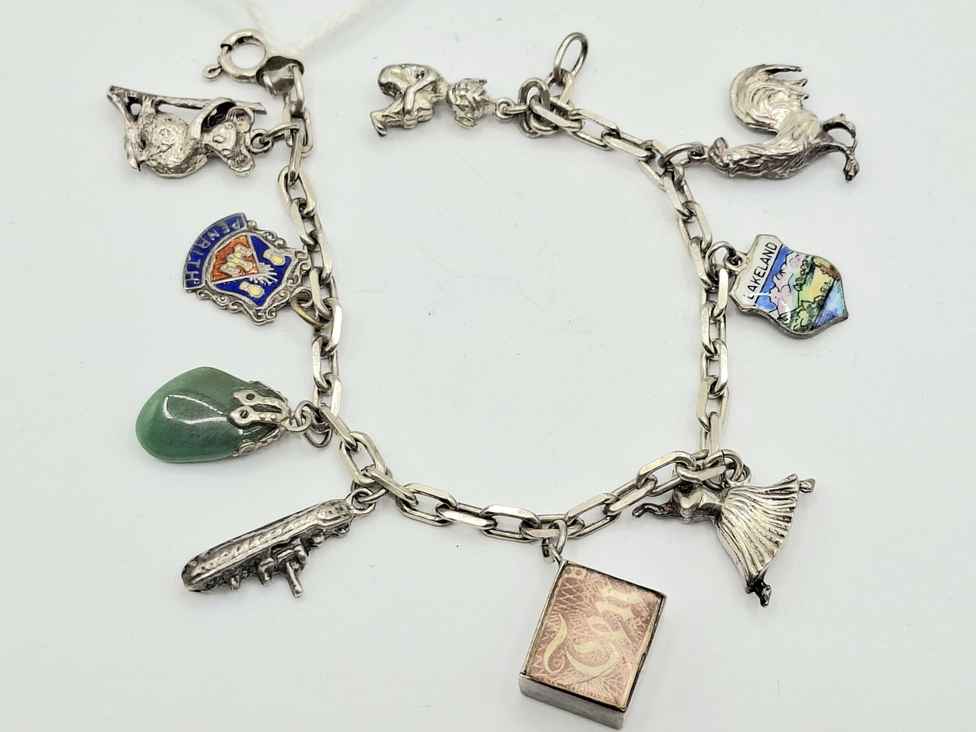 1020 · STERLING SILVER CHARM BRACELET
