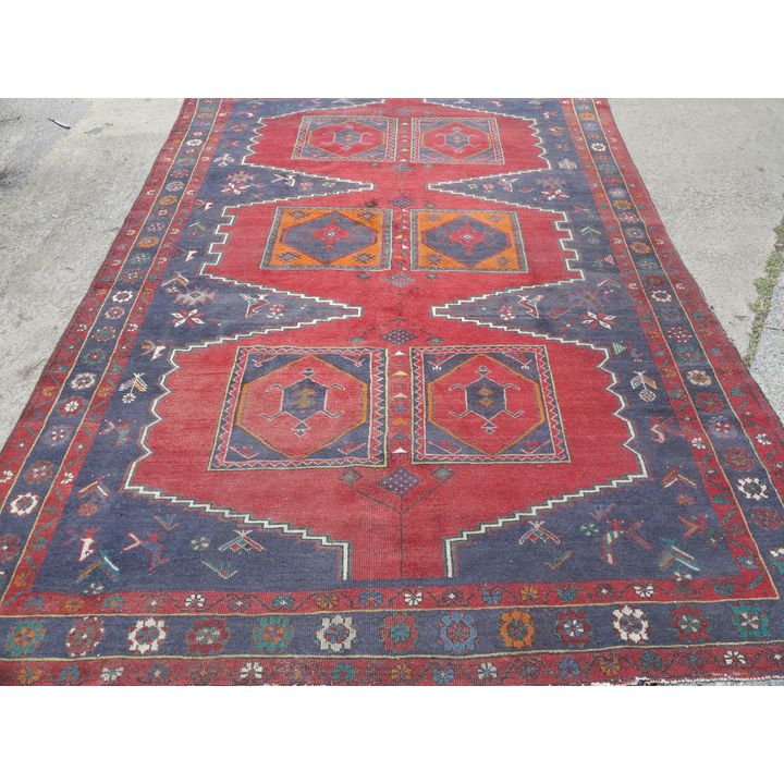 WORN PERSIAN CARPET