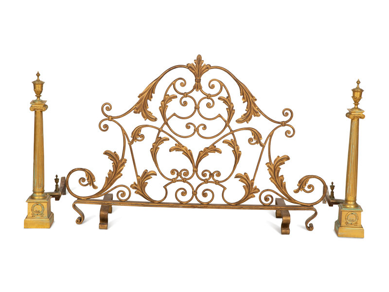 A Pair of Continental Gilt Bronze Chenets and an Associated Fire Screen
Height of chenets 29 inches. 