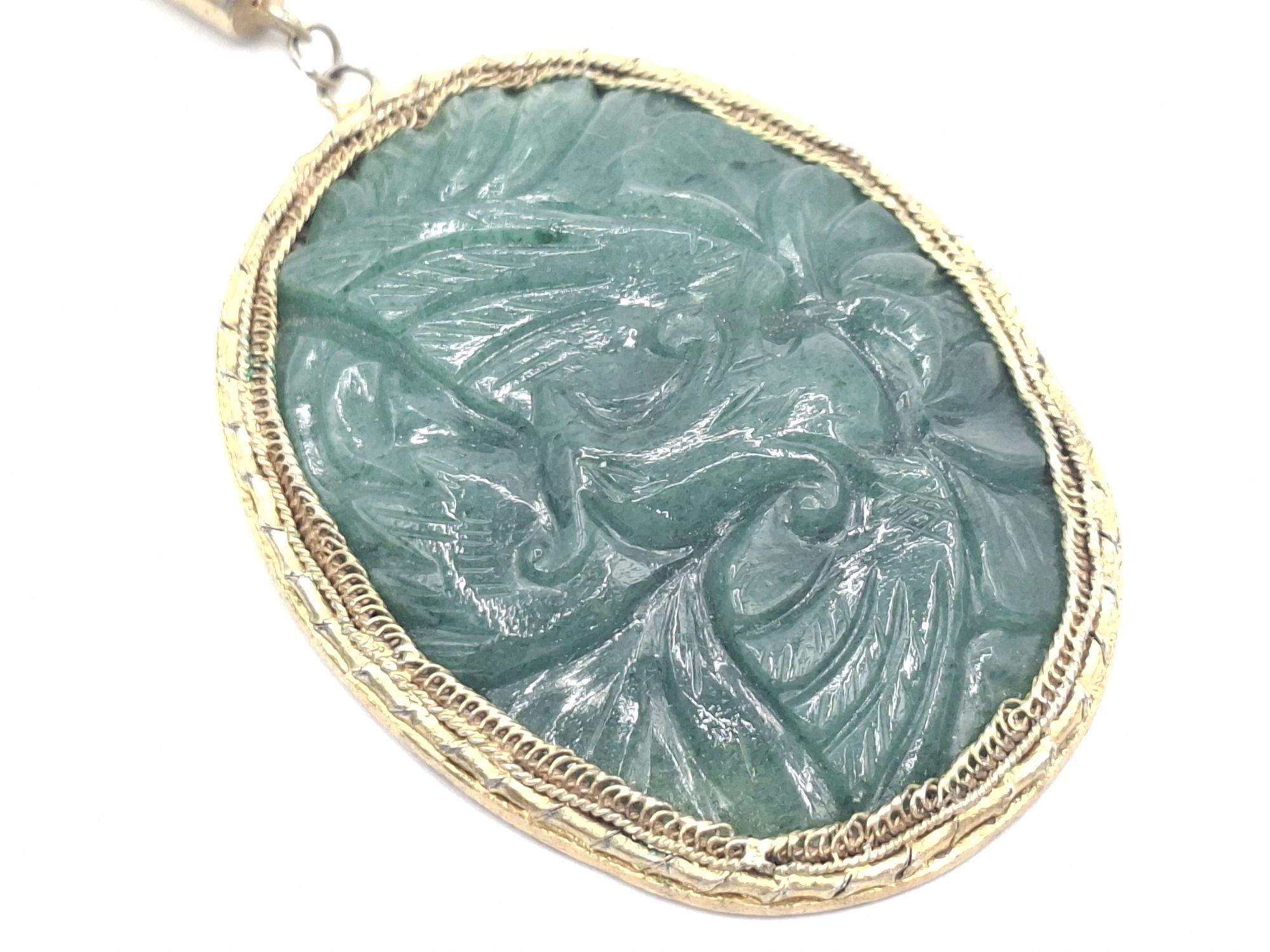 1049 · ORIENTAL CARVED JADE PENDANT