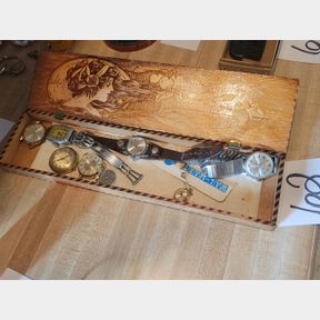 Decorative wood box of vintage and other watches