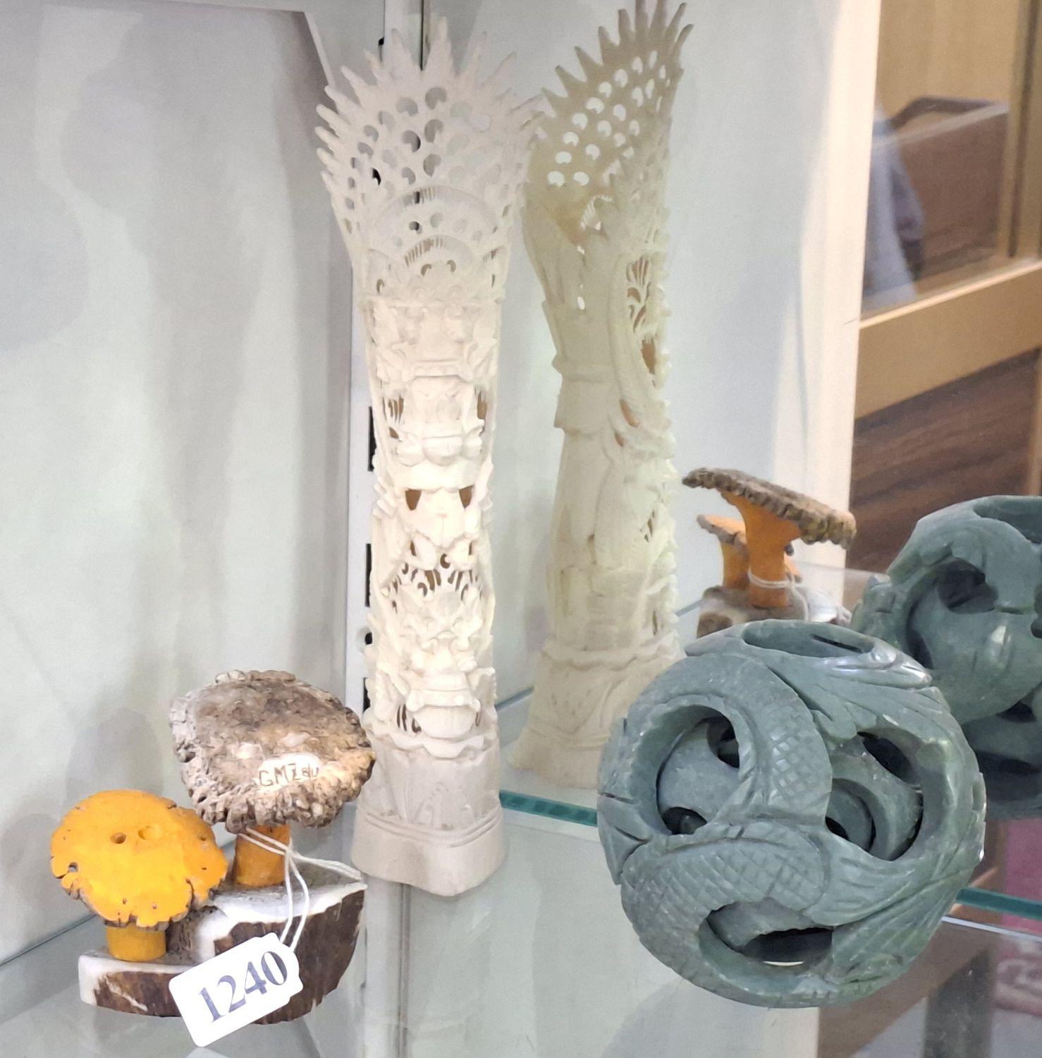 Puzzle Ball And Bone Carvings