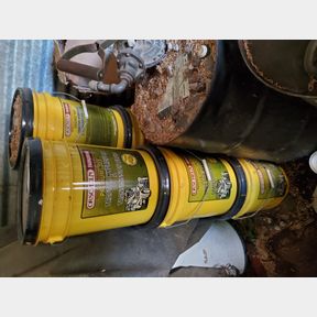 7 - 5 gallon buckets of "303" Hyd and Tranny Oil