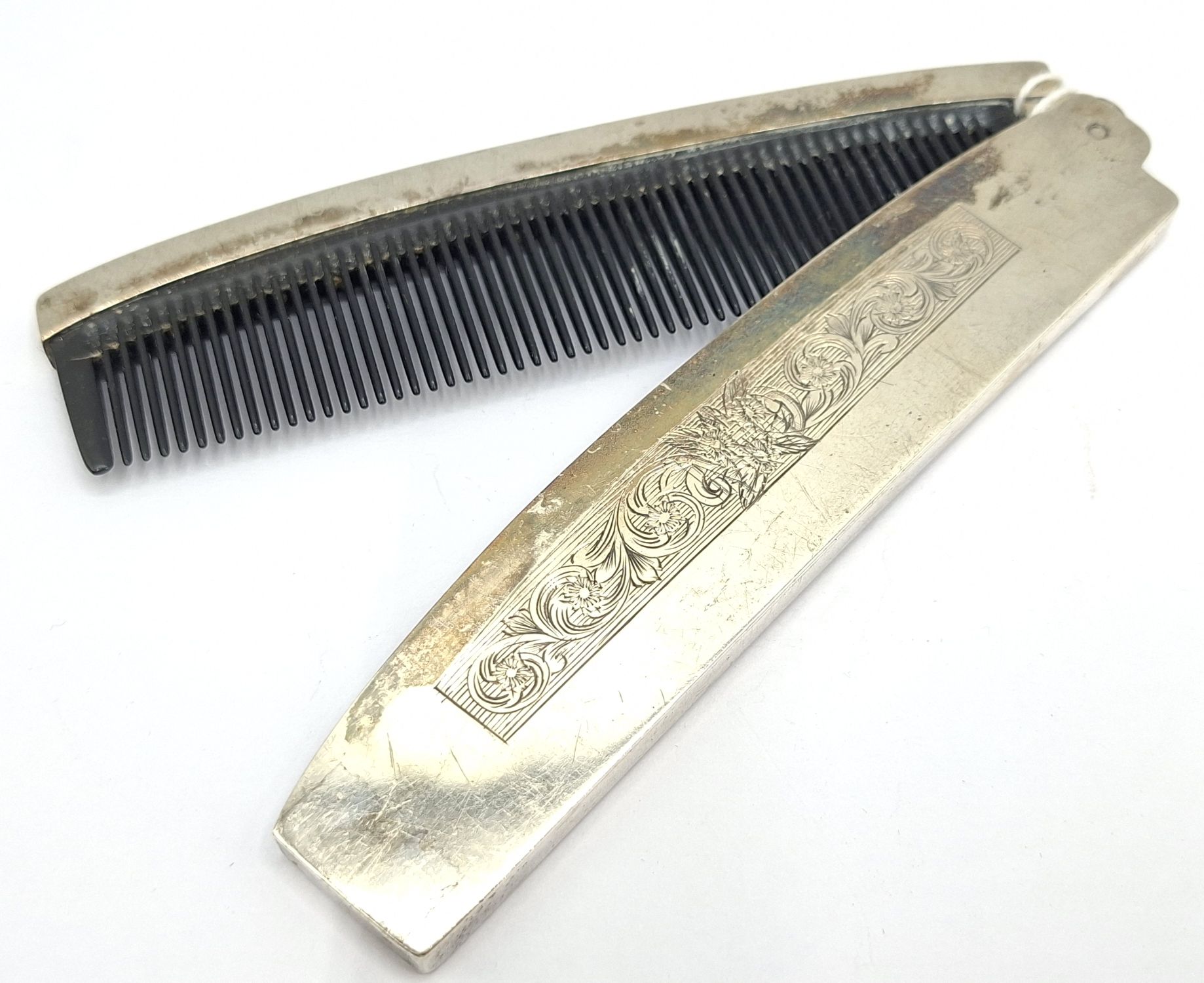 1031 · STERLING SILVER COMB