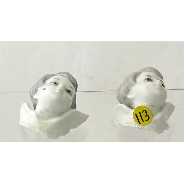A PAIR OF SMALL LLADRO ANGEL BUSTS.