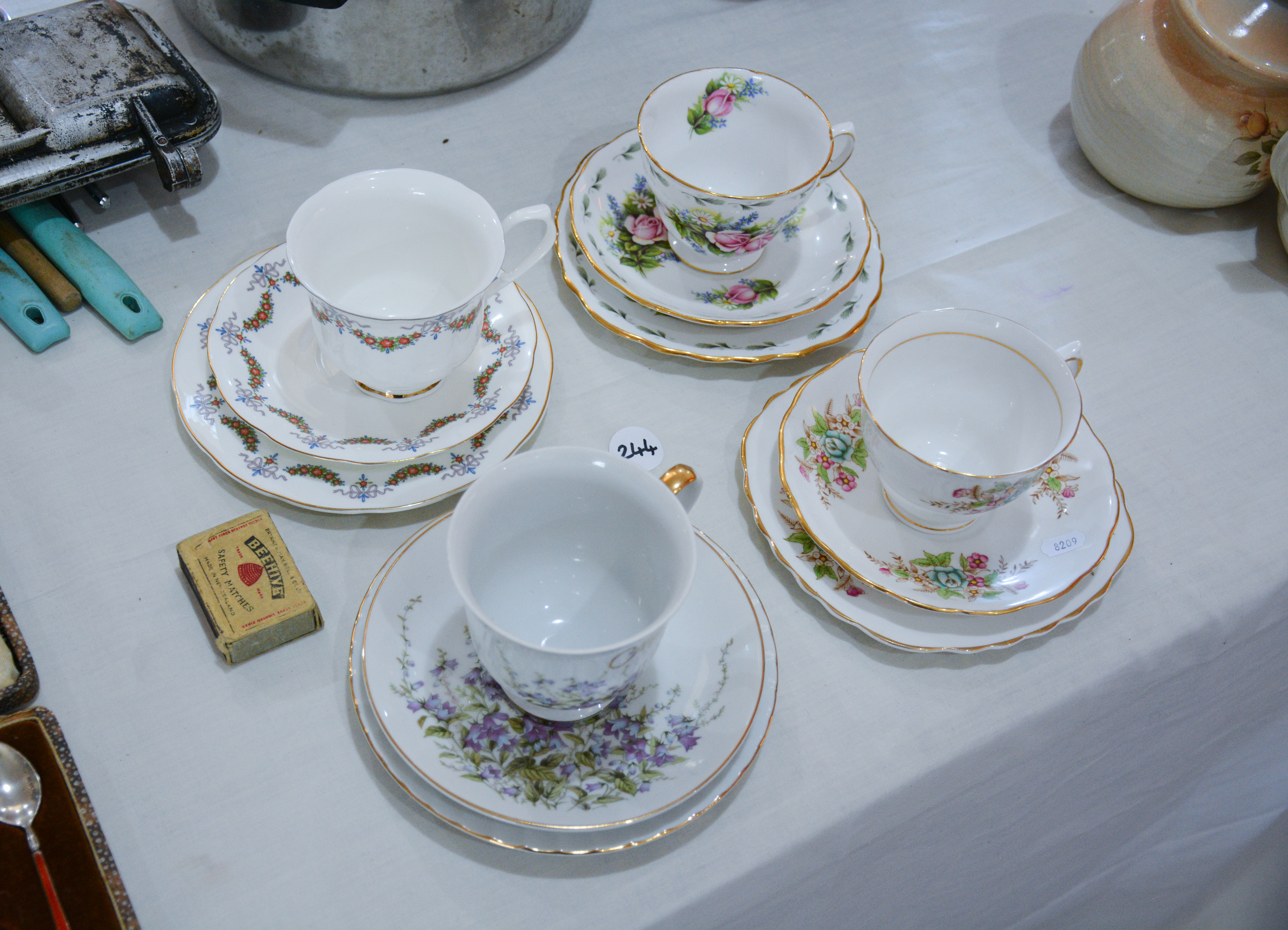 Fine China Trios x 4 — sold at auction in New Zealand for $10