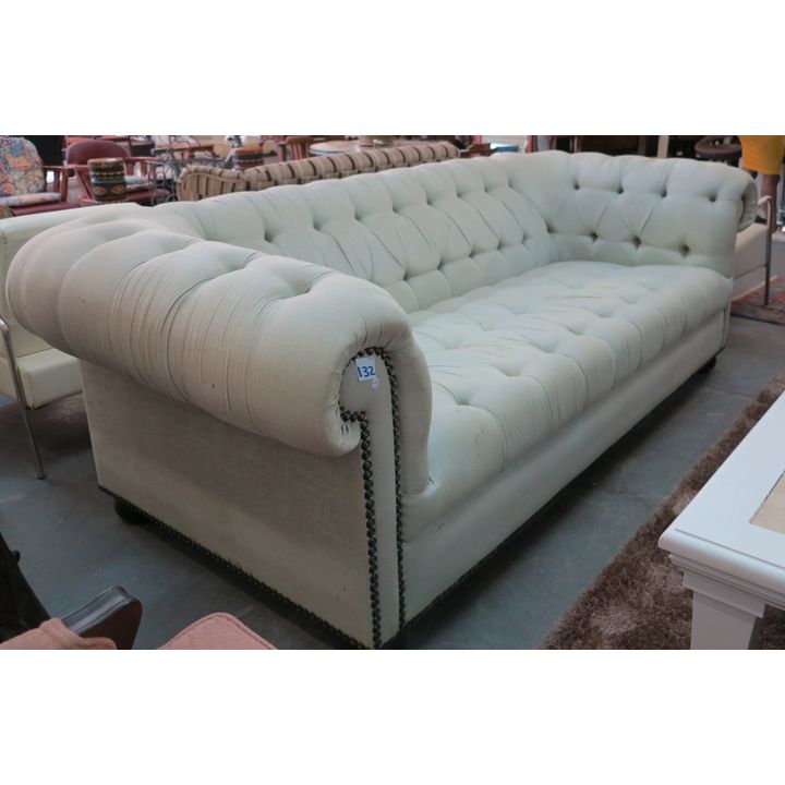 THREE-SEATER BUTTON-UPHOLSTERED SOFA,