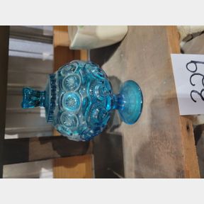 Blue lidded compote and oriental Roseville vase