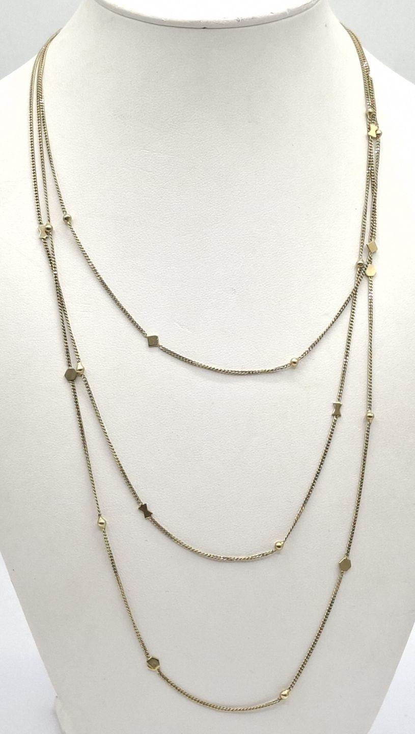 1111 · ITALIAN 9CT GOLD TRIPLE STRAND NECKLACE