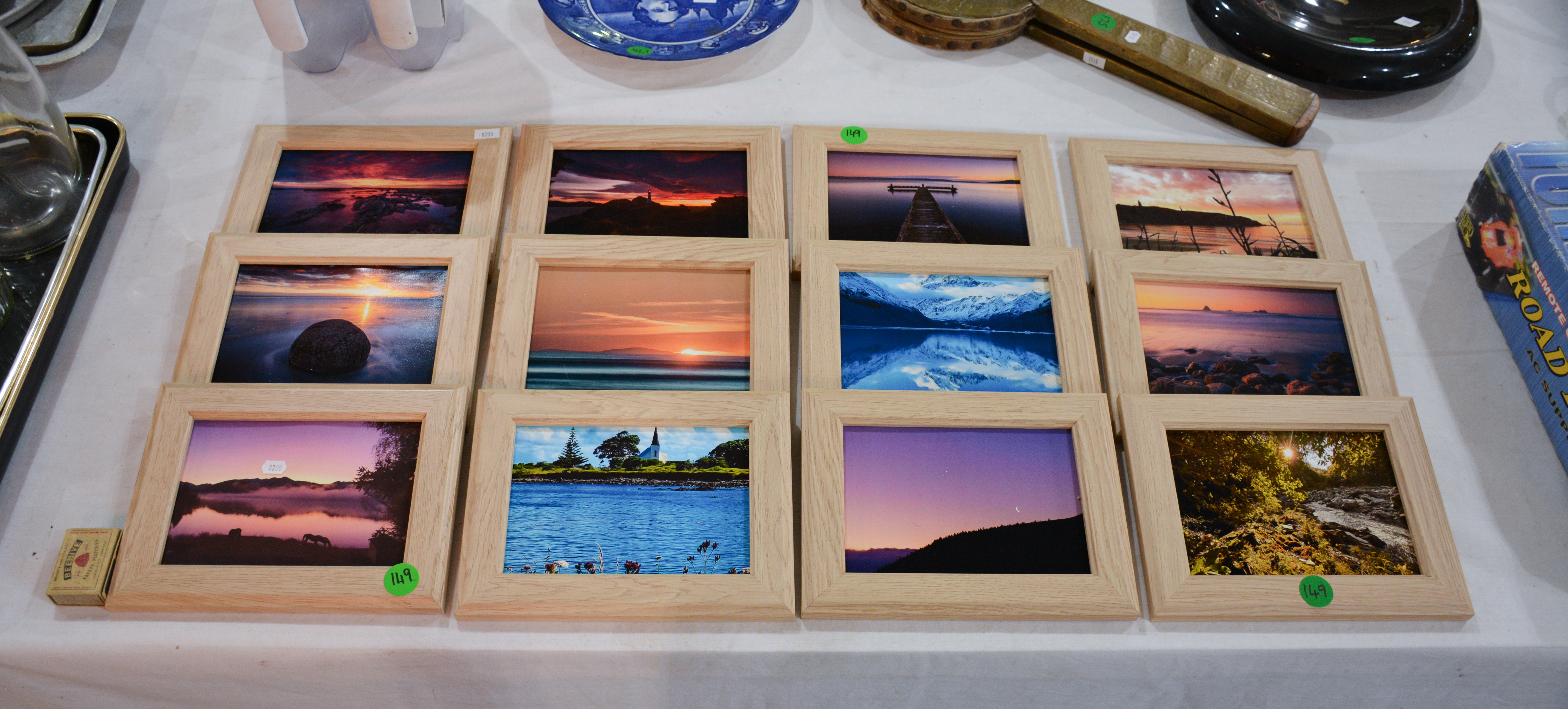 Framed Photos x 12 — sold at auction in New Zealand for $5